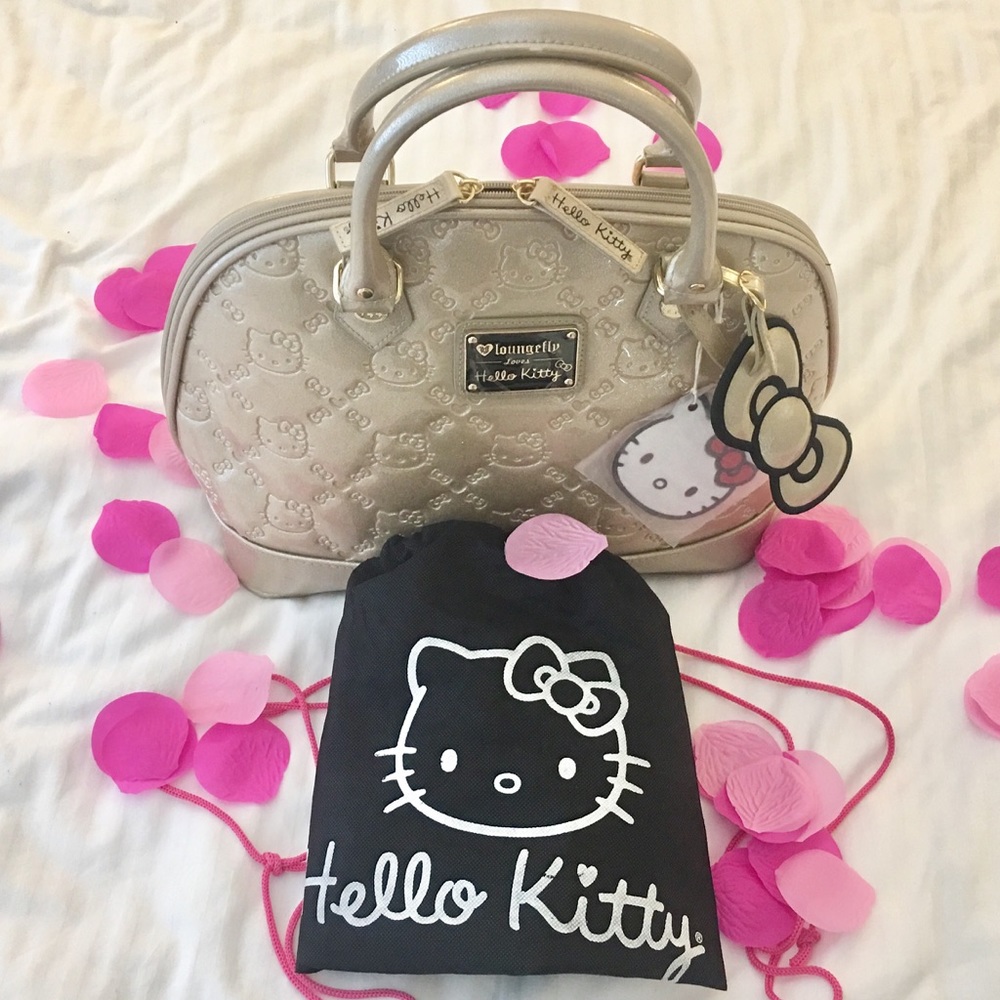 Hello kitty soft gold dome bag by Loungefly